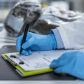 Organic Certification Laboratory. Filling a Form for Organic Certification Procedure