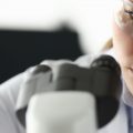 Adult caucasian beauty woman chemist in protective